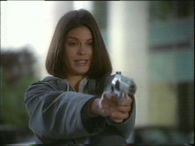 [L&C: Lois is holding a gun]