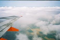 A picture from the plane just above the clouds.
