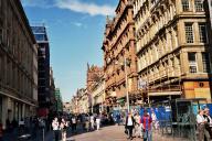 The main shopping street of Glasgow, other side of the road is now sunny.
