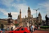 The main square in Glasgow, now with the sun in a different position.
