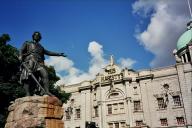 A statue of William Wallace, pointing at Her Majesty's Theatre in Aberdeen.

